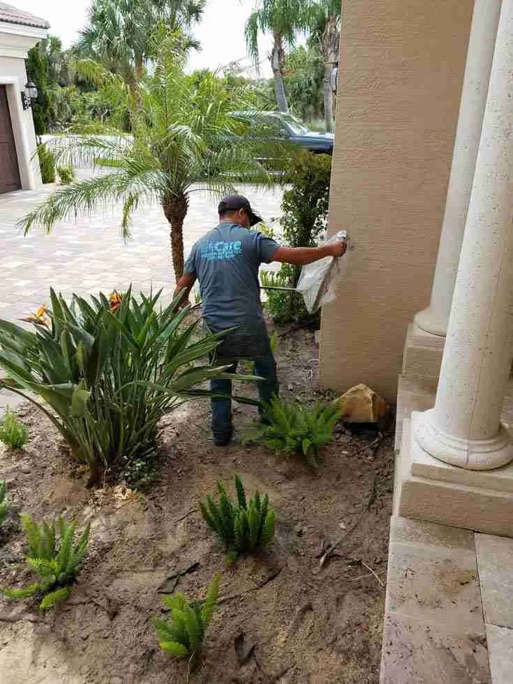 WaterCare technician diagnosing an irrigation valve in Palm Coast, FL
