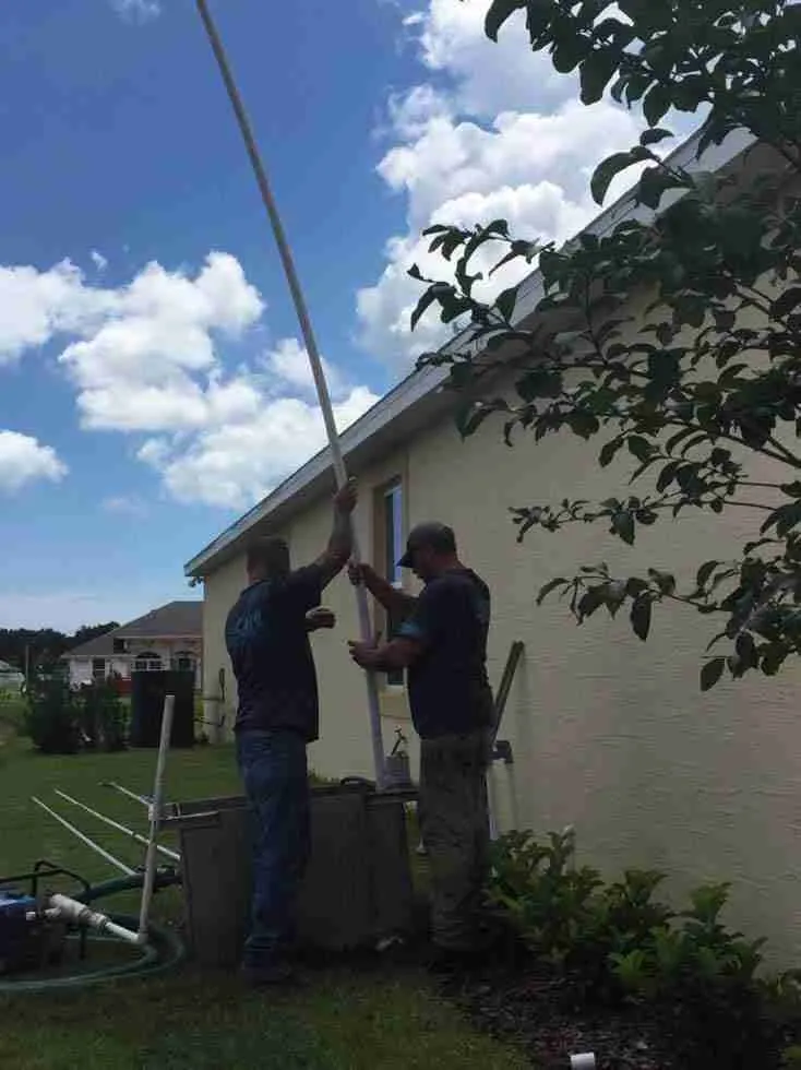 WaterCare crew installing a commercial well and pump